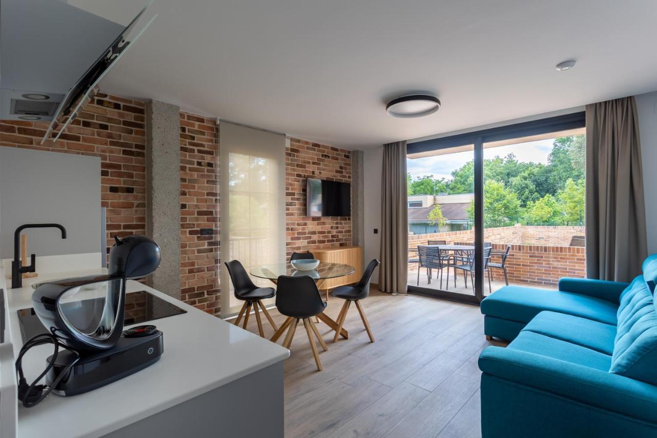 Alma Marina Apartamentos Сомо Екстериор снимка
